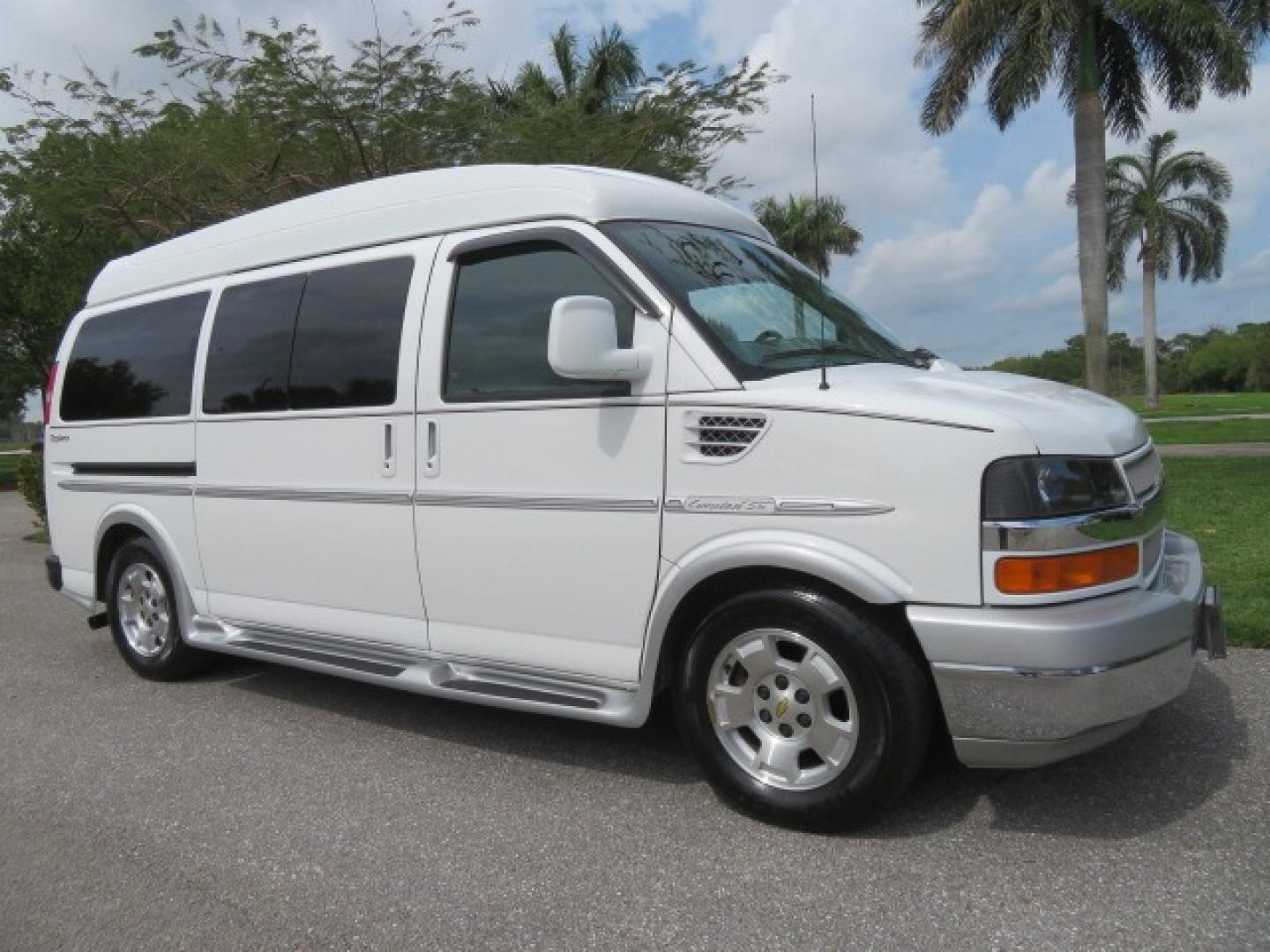 2010 White /Gray Chevrolet Express (1GNUGCD48A1) , located at 4301 Oak Circle #19, Boca Raton, FL, 33431, (954) 561-2499, 26.388861, -80.084038 - You are looking at a Gorgeous 2010 Chevy Express Handicap Wheelchair Conversion Van Explorer Limited SE with 31K Original Miles, Braun Century 750lb Side Entry Wheelchair lift, Tie Down System in the Floor, Rear Entertainment with Flat Screen TV/DVD, Leather Interior, Rear Power Folding Bench Seat/b - Photo#7